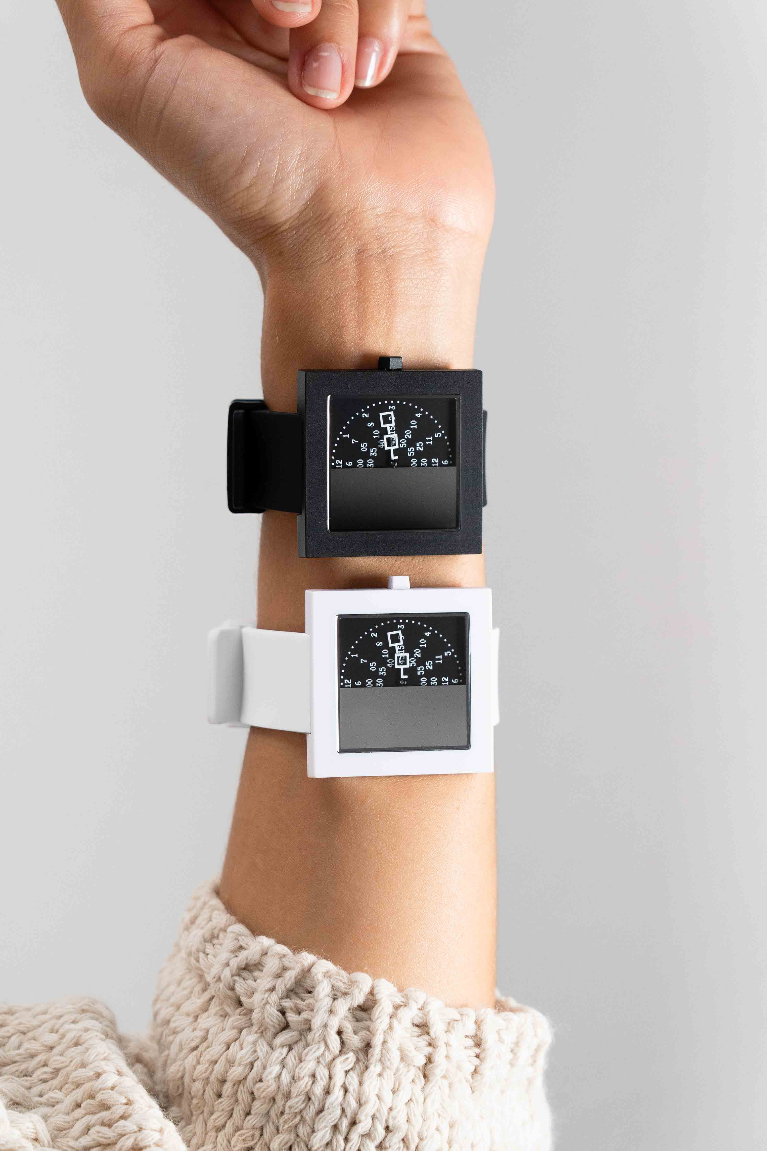 first edition of the Nouns DAO watch, hyperculture timepiece, get web3 on your wrist. Lady's watch in purple and white and black with mysterious time display and sapphire crystal and japanese miyota movement